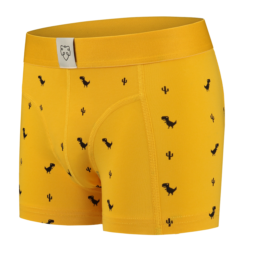 gelbe Boxershorts aus Biobaumwolle von A-dam mit schwarzen Googel Chrome Dino und Kakteen